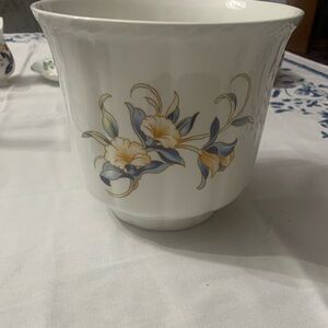 Charming Floral White Vase with Blue and Yellow Accents